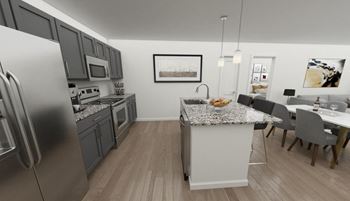a kitchen and dining area in a 555 waverly unit
